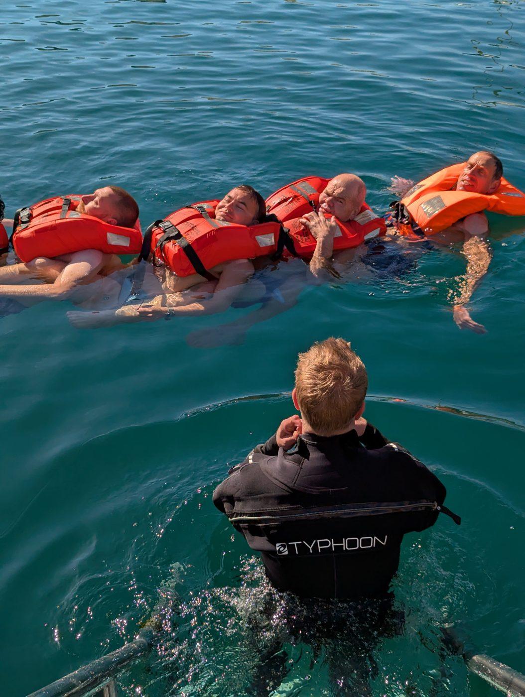 James Daniel Holman directing a sea survival drill